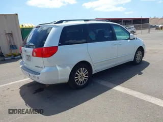 2010 Toyota Sienna XLE with VIN 5TDYK4CC7AS291119, listed as a IAAI auction lot 41742917 with 201,590 mi miles. Bid and sale history available at carsss.com. Image 4.