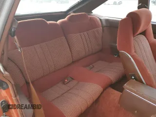 1983 Toyota Supra z VIN JT2MA67L9D0056034, wystawiony jako Copart lot #82382484 z przebiegiem 39 338 mil mil oraz Szkoda całkowita • Salvage title. Historia ofert i sprzedaży dostępna na DreamBid. Obrazek 10.
