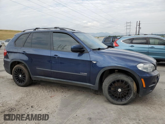 2012 BMW X5 35i с VIN 5UXZV4C5XCL749123, выставлен на аукционе Copart как лот 65259585 с пробегом 124 193 миль миль и Чистый • Clean title. История ставок и продаж доступна на DreamBid. Изображение 4.