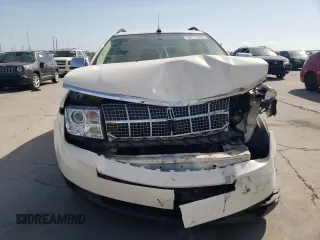 2007 Lincoln MKX z VIN 2LMDU68C27BJ22858, wystawiony jako Copart lot #54777825 z przebiegiem 147 548 mil mil oraz Szkoda całkowita • Salvage title. Historia ofert i sprzedaży dostępna na DreamBid. Obrazek 5.