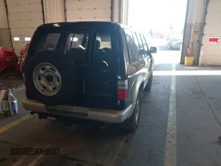 2001 Isuzu Trooper S with VIN JACDJ58X917J09299, listed as a IAAI auction lot 41296724 with 131,829 mi miles and . Bid and sale history available at DreamBid. Image 4.