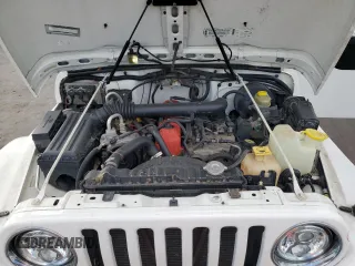 1999 Jeep Wrangler Sahara with VIN 1J4FY49SXXP414414, listed as a Copart auction lot 41643665 with 154,810 mi miles and Salvage Title. Bid and sale history available at carsss.com. Image 12.