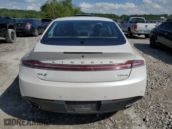 2013 Lincoln MKZ z VIN 3LN6L2G98DR804632, wystawiony jako Copart lot #56985055 z przebiegiem 128 509 mil mil oraz Szkoda całkowita • Salvage title. Historia ofert i sprzedaży dostępna na DreamBid. Obrazek 6.