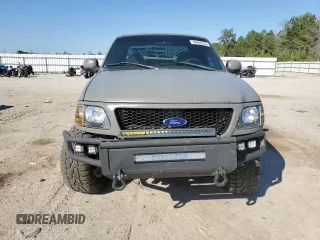 1999 Ford F-150 with VIN 1FTRX17W1XNC25527, listed as a Copart auction lot 48662525 with 150,544 mi miles and Salvage Title. Bid and sale history available at DreamBid. Image 5.