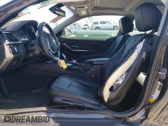2015 BMW 4 Series 428i xDrive z VIN WBA3N9C55FK247728, wystawiony jako Copart lot #47358985 z przebiegiem 62 284 mil mil oraz Szkoda całkowita • Salvage title. Historia ofert i sprzedaży dostępna na DreamBid. Obrazek 7.