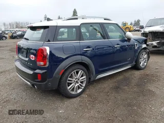 2019 MINI Countryman Cooper S z VIN WMZYT5C54K3G92704, wystawiony jako IAAI lot #41821521 z przebiegiem 95 087 mil mil oraz . Historia ofert i sprzedaży dostępna na DreamBid. Obrazek 4.
