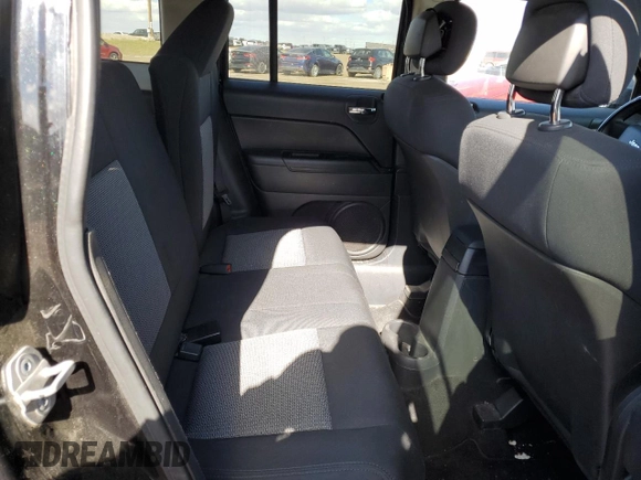 2010 Jeep Patriot Sport with VIN 1J4NF2GB8AD519311, listed as a Copart auction lot 53799085 with 203,762 mi miles and Salvage Title. Bid and sale history available at carsss.com. Image 11.