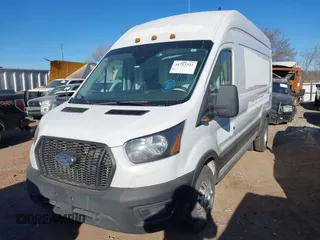 2023 Ford Transit Cargo z VIN 1FTBF4U80PKA47025, wystawiony jako IAAI lot #41715521 z przebiegiem 104 952 mil mil oraz . Historia ofert i sprzedaży dostępna na DreamBid. Obrazek 17.