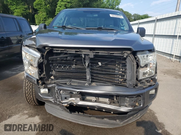 2015 Ford F-150 XL with VIN 1FTEX1CG0FFC37674, listed as a Copart auction lot 62268035 with 149,842 mi miles and Salvage title. Bid and sale history available at DreamBid. Image 5.