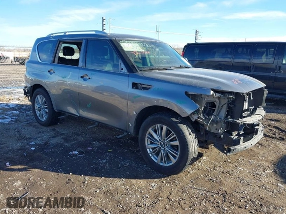 2020 Infiniti QX80 Luxe with VIN JN8AZ2NE5L9253264, listed as a IAAI auction lot 41012767 with 106,672 mi miles and . Bid and sale history available at DreamBid. Image 1.