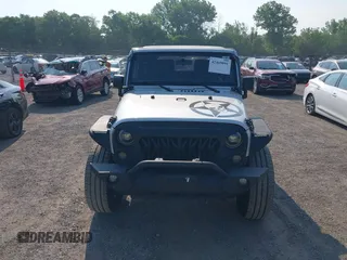 2012 Jeep Wrangler Sport z VIN 1C4AJWAG9CL255278, wystawiony jako IAAI lot #42469091 z przebiegiem 140 480 mil mil oraz . Historia ofert i sprzedaży dostępna na DreamBid. Obrazek 13.
