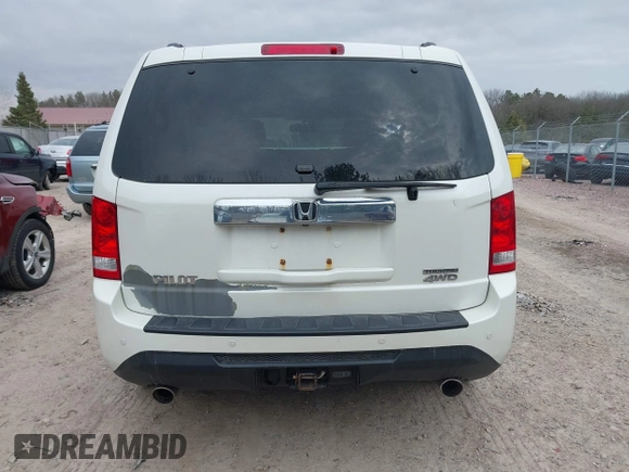 2014 Honda Pilot Touring with VIN 5FNYF4H91EB041614, listed as a IAAI auction lot 42050405 with 158,236 mi miles and . Bid and sale history available at DreamBid. Image 16.