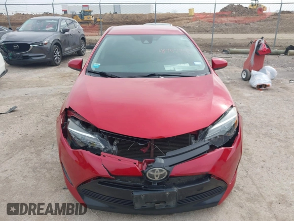 2019 Toyota Corolla L with VIN 5YFBURHEXKP882871, listed as a IAAI auction lot 41747710 with 104,117 mi miles. Bid and sale history available at carsss.com. Image 12.