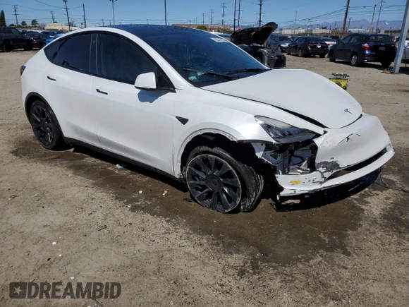 2022 Tesla Model Y Long Range z VIN 7SAYGDEEXNF455766, wystawiony jako Copart lot #49641685 z przebiegiem 51 142 mil mil oraz Szkoda całkowita • Salvage title. Historia ofert i sprzedaży dostępna na DreamBid. Obrazek 4.