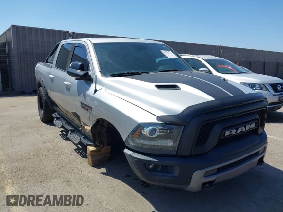 2016 Ram 1500 Rebel z VIN 1C6RR7YT5GS251994, wystawiony jako IAAI lot #42139378 z przebiegiem 102 736 mil mil oraz . Historia ofert i sprzedaży dostępna na DreamBid. Obrazek 6.