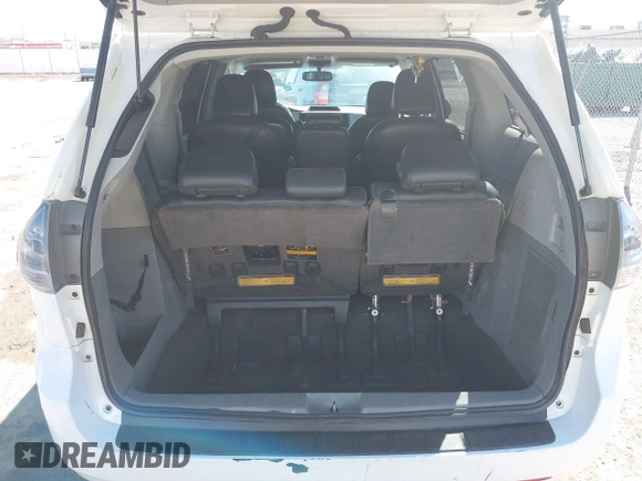2014 Toyota Sienna SE with VIN 5TDXK3DC0ES477207, listed as a IAAI auction lot 41624619 with 213,881 mi miles and . Bid and sale history available at DreamBid. Image 16.
