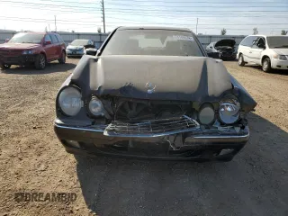 2002 Mercedes-Benz E-Class with VIN WDBJF70J22B489706, listed as a Copart auction lot 71109874 with 59,167 mi miles and Salvage Title. Bid and sale history available at carsss.com. Image 5.