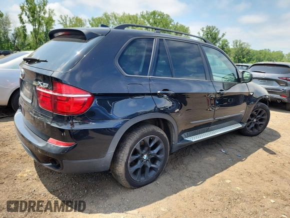 2012 BMW X5 35i with VIN 5UXZV4C5XCL765757, listed as a Copart auction lot 64497535 with 178,836 mi miles and Salvage title. Bid and sale history available at DreamBid. Image 3.