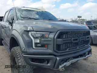 2020 Ford F-150 Raptor with VIN 1FTFW1RG4LFA37620, listed as a IAAI auction lot 41483733 with 61,081 mi miles and . Bid and sale history available at carsss.com. Image 1.