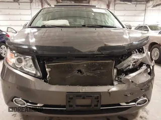 2016 Honda Odyssey Touring Elite with VIN 5FNRL5H92GB045824, listed as a IAAI auction lot 41872220 with 120,557 mi miles. Bid and sale history available at carsss.com. Image 6.