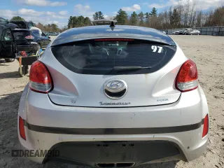 2013 Hyundai Veloster w/Black Int z VIN KMHTC6AD6DU121277, wystawiony jako Copart lot #53222805 z przebiegiem 155 236 mil mil oraz Czysty tytuł • Clean title. Historia ofert i sprzedaży dostępna na DreamBid. Obrazek 6.