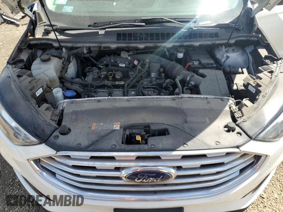 2020 Ford Edge SEL z VIN 2FMPK4J93LBB19642, wystawiony jako Copart lot #56647095 z przebiegiem 29 638 mil mil oraz Szkoda całkowita • Salvage title. Historia ofert i sprzedaży dostępna na DreamBid. Obrazek 12.