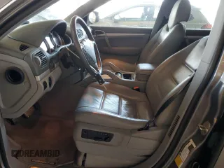 2010 Porsche Cayenne with VIN WP1AB2AP0ALA50336, listed as a Copart auction lot 62089865 with 153,942 mi miles and Salvage title. Bid and sale history available at DreamBid. Image 7.