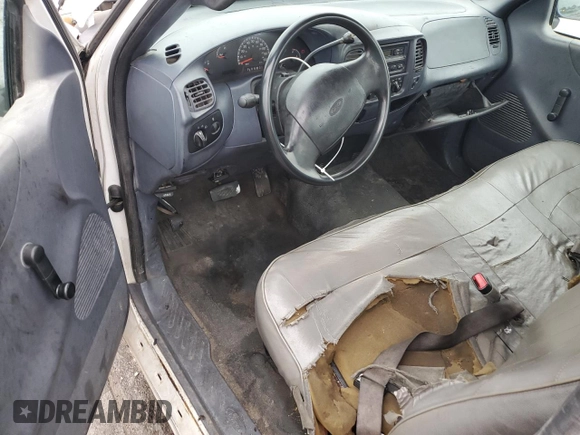 2000 Ford F-150 XL с VIN 1FTRF17W2YKA55667, выставлен на аукционе Copart как лот 83191704 с пробегом Не указан миль и Списание • Salvage title. История ставок и продаж доступна на DreamBid. Изображение 8.