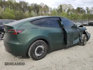 2024 Tesla Model Y Long Range z VIN 7SAYGAEEXRF987104, wystawiony jako Copart lot #54056015 z przebiegiem 24 027 mil mil oraz Szkoda całkowita • Salvage title. Historia ofert i sprzedaży dostępna na DreamBid. Obrazek 3.