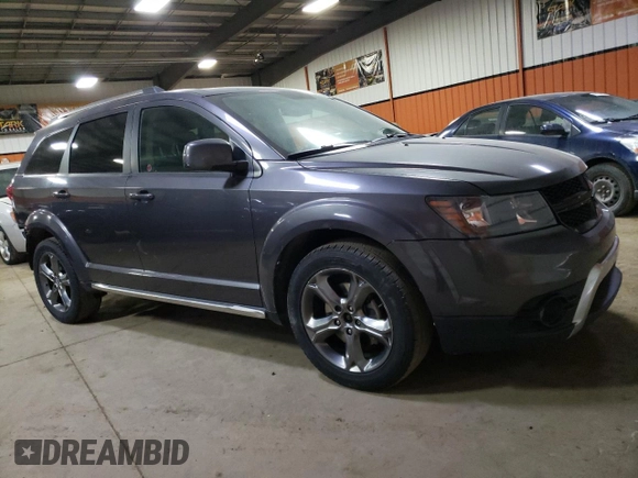 2015 Dodge Journey Crossroad z VIN 3C4PDDGGXFT519212, wystawiony jako Copart lot #46250663 z przebiegiem 128 417 mil mil oraz Szkoda całkowita • Salvage title. Historia ofert i sprzedaży dostępna na DreamBid. Obrazek 4.
