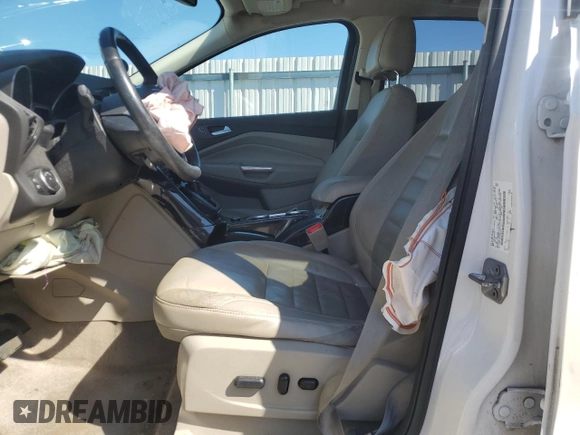 2016 Ford Escape Titanium with VIN 1FMCU9J95GUC74411, listed as a Copart auction lot 50061075 with 198,865 mi miles and Salvage Title. Bid and sale history available at DreamBid. Image 7.