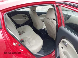 2013 Kia Rio LX with VIN KNADM4A34D6310495, listed as a IAAI auction lot 41986664 with 129,145 mi miles. Bid and sale history available at carsss.com. Image 8.