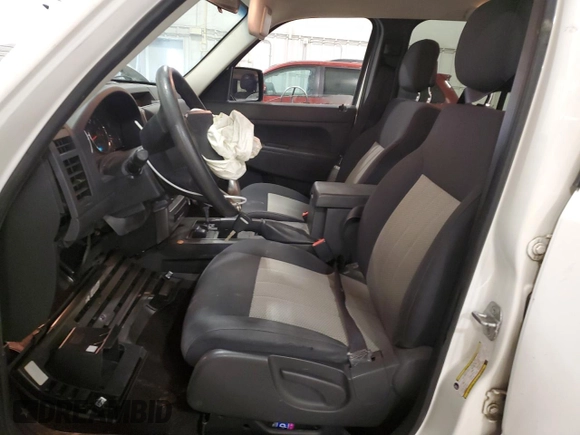 2010 Jeep Liberty Sport with VIN 1J4PN2GK2AW115064, listed as a Copart auction lot 57344645 with 114,275 mi miles and Salvage title. Bid and sale history available at DreamBid. Image 7.