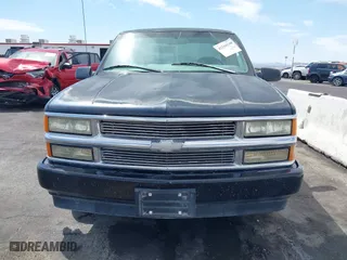 1999 Chevrolet C/K 1500 with VIN 1GCEC19R0XR146778, listed as a IAAI auction lot 42104540 with 221,531 mi miles. Bid and sale history available at carsss.com. Image 6.