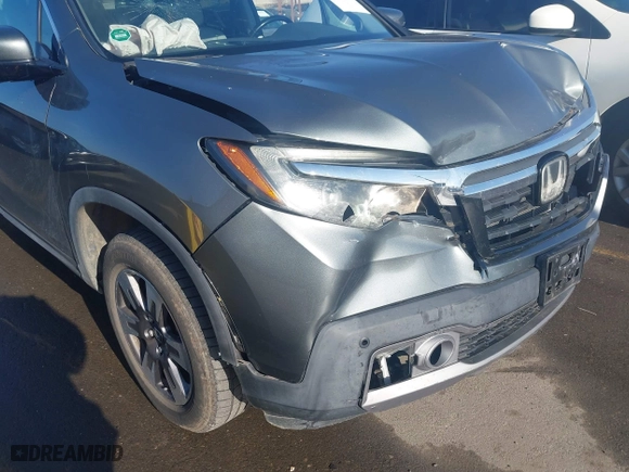 2017 Honda Ridgeline RTL-E with VIN 5FPYK3F77HB012606, listed as a IAAI auction lot 41409677 with 93,943 mi miles. Bid and sale history available at carsss.com. Image 6.