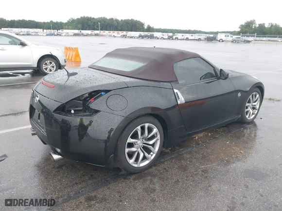 2010 Nissan 370Z Touring with VIN JN1AZ4FH7AM304809, listed as a IAAI auction lot 39876962 with 66,418 mi miles. Bid and sale history available at carsss.com. Image 4.