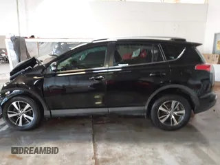 2018 Toyota RAV4 XLE with VIN 2T3WFREV1JW471931, listed as a IAAI auction lot 41332851 with 123,657 mi miles. Bid and sale history available at carsss.com. Image 15.
