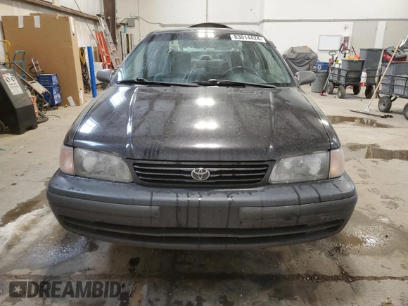 1999 Toyota Tercel z VIN JT2AC53LXX0390154, wystawiony jako Copart lot #83014424 z przebiegiem 182 579 mil mil oraz Szkoda całkowita • Salvage title. Historia ofert i sprzedaży dostępna na DreamBid. Obrazek 5.