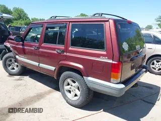 2001 Jeep Cherokee Sport with VIN 1J4FF48S51L516712, listed as a IAAI auction lot 42247399 with 323,576 mi miles and . Bid and sale history available at DreamBid. Image 3.