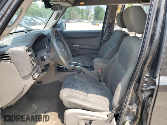 2006 Jeep Commander z VIN 1J8HG48K36C263515, wystawiony jako Copart lot #59080765 z przebiegiem 167 635 mil mil oraz Szkoda całkowita • Salvage title. Historia ofert i sprzedaży dostępna na DreamBid. Obrazek 7.
