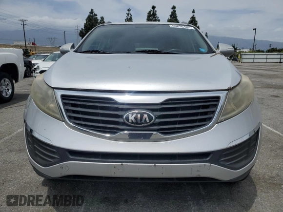 2013 Kia Sportage LX z VIN KNDPB3A26D7357884, wystawiony jako Copart lot #55836165 z przebiegiem 140 252 mil mil oraz Szkoda całkowita • Salvage title. Historia ofert i sprzedaży dostępna na DreamBid. Obrazek 5.