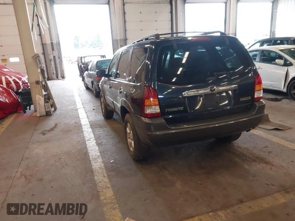 2003 Mazda Tribute LX with VIN 4F2YZ94193KM56345, listed as a IAAI auction lot 41200769 with 141,728 mi miles and . Bid and sale history available at DreamBid. Image 3.