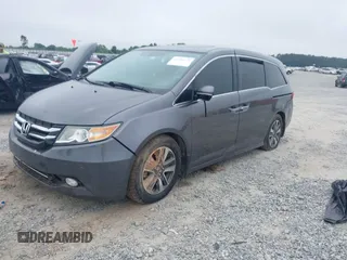 2014 Honda Odyssey Touring with VIN 5FNRL5H98EB008953, listed as a IAAI auction lot 42291179 with Not provided miles and . Bid and sale history available at DreamBid. Image 16.