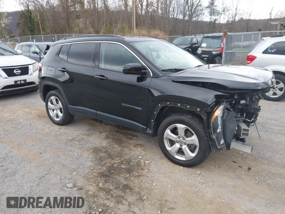 2019 Jeep Compass Latitude with VIN 3C4NJDBB1KT754314, listed as a IAAI auction lot 41869595 with 65,162 mi miles. Bid and sale history available at carsss.com. Image 1.