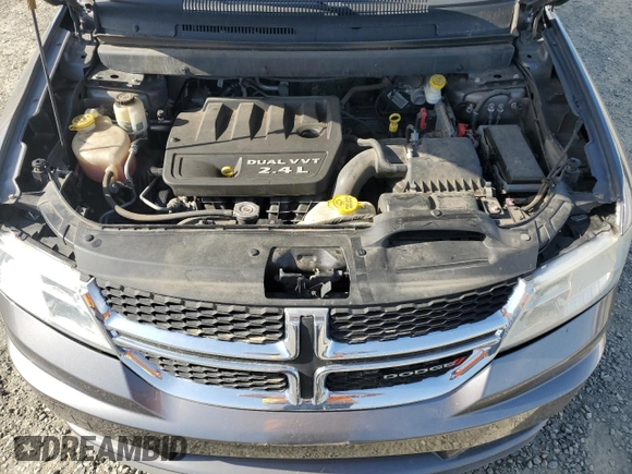 2013 Dodge Journey American Value with VIN 3C4PDCAB8DT590509, listed as a Copart auction lot 57347375 with 203,642 mi miles and Clean title. Bid and sale history available at DreamBid. Image 12.