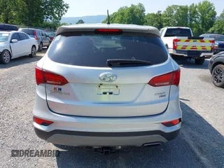 2018 Hyundai Santa Fe 2.4L z VIN 5XYZTDLB1JG546708, wystawiony jako IAAI lot #42399917 z przebiegiem 131 932 mil mil oraz . Historia ofert i sprzedaży dostępna na DreamBid. Obrazek 16.