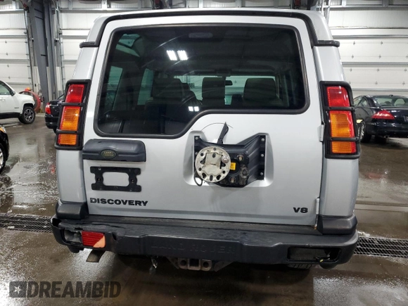 2003 Land Rover Discovery with VIN SALTY16493A801832, listed as a Copart auction lot 58690064 with 125,569 mi miles and Salvage Title. Bid and sale history available at DreamBid. Image 6.