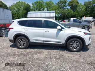 2019 Hyundai Santa Fe SE with VIN 5NMS23AD0KH013811, listed as a IAAI auction lot 42337926 with 87,000 mi miles and . Bid and sale history available at DreamBid. Image 13.