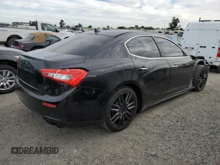 2015 Maserati Ghibli with VIN ZAM57XSA5F1149616, listed as a Copart auction lot 71738433 with 82,300 mi miles. Bid and sale history available at carsss.com. Image 3.