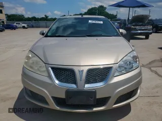 2009 Pontiac G6 1SB z VIN 1G2ZJ57B994242322, wystawiony jako Copart lot #58396425 z przebiegiem 263 626 mil mil oraz Szkoda całkowita • Salvage title. Historia ofert i sprzedaży dostępna na DreamBid. Obrazek 5.